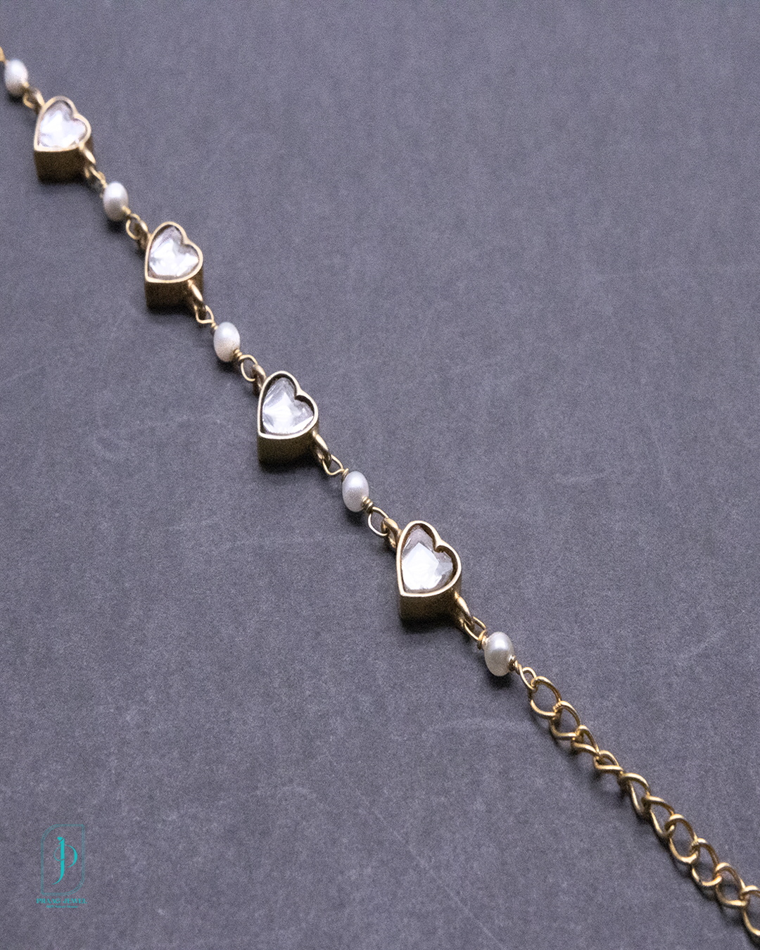 Heart-Shaped Kundan Freshwater Pearl Bracelet in 925 Silver with Gold Polish